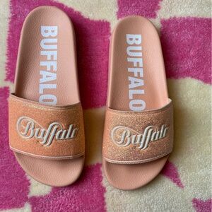 Pink and white Buffalo London glitter slides